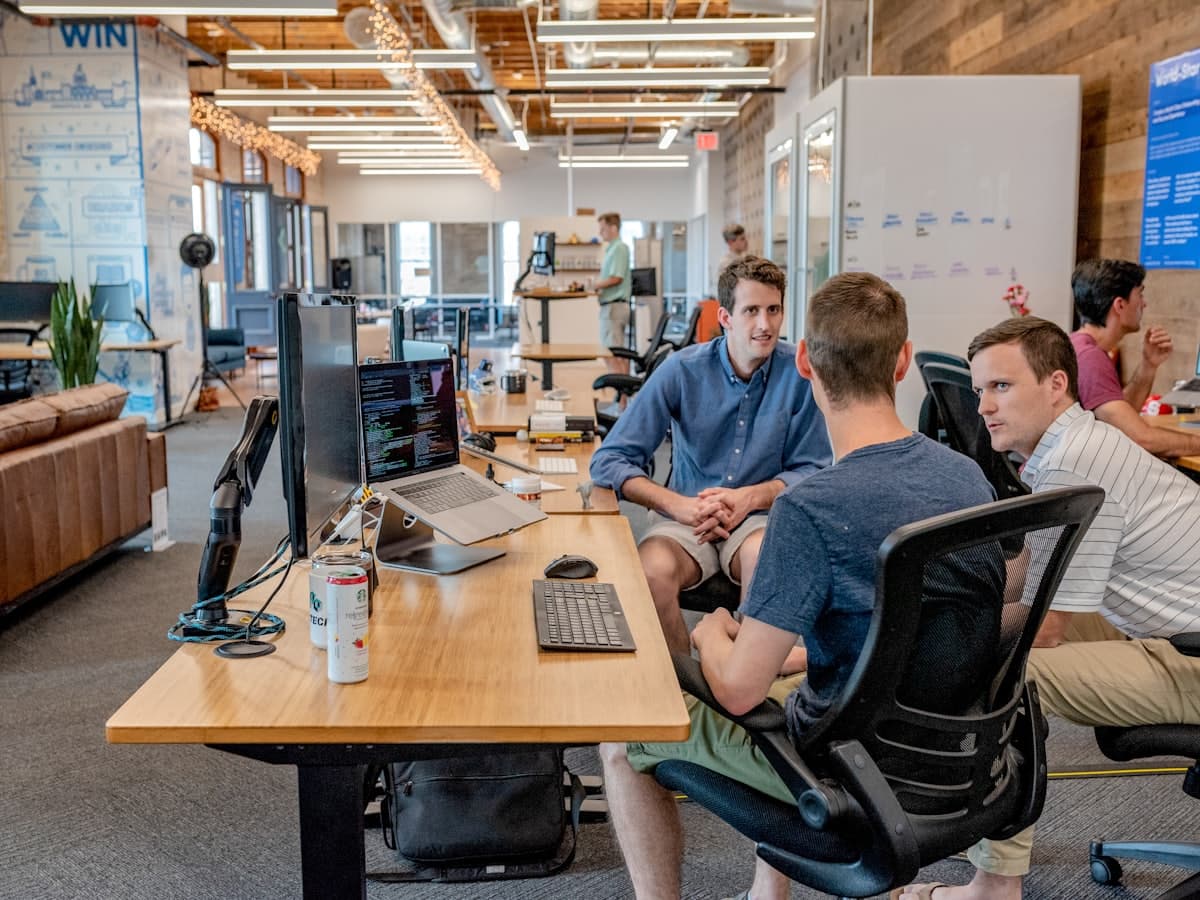A diverse team working together in a bright small business office